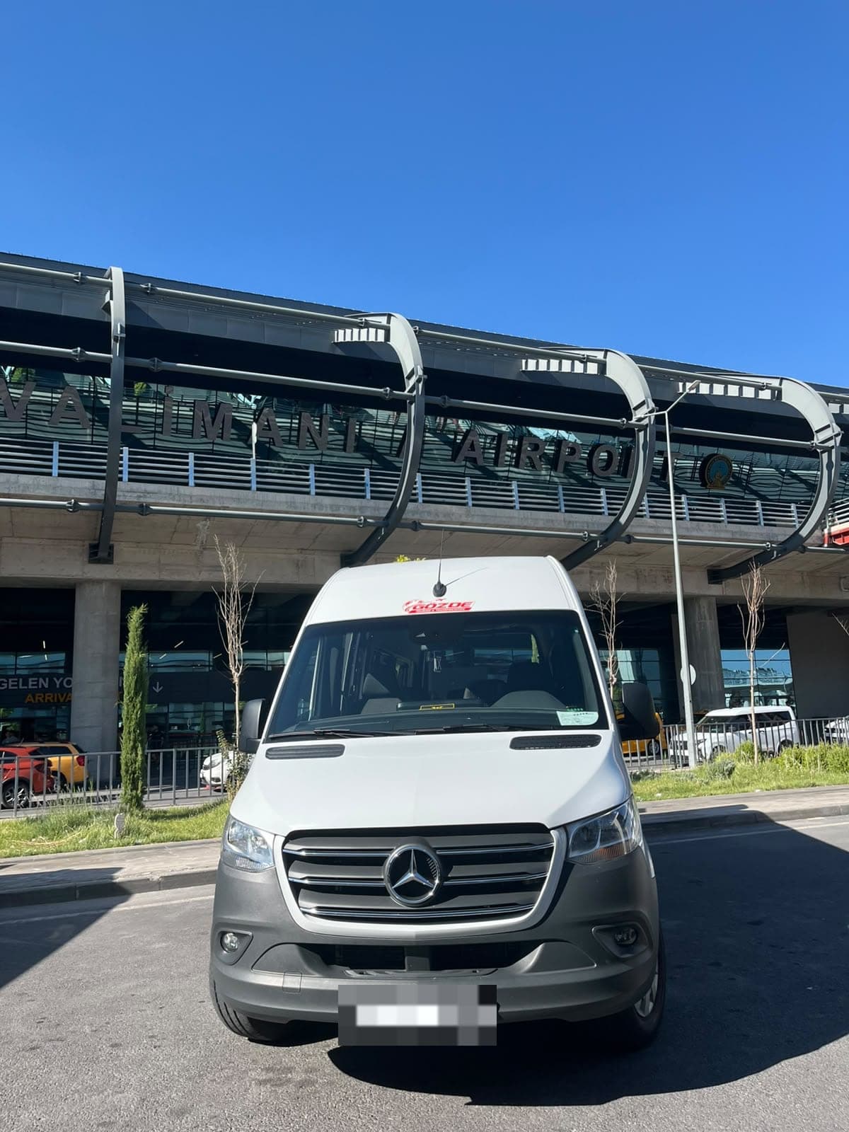 White Mercedes Sprinter transfer minibus