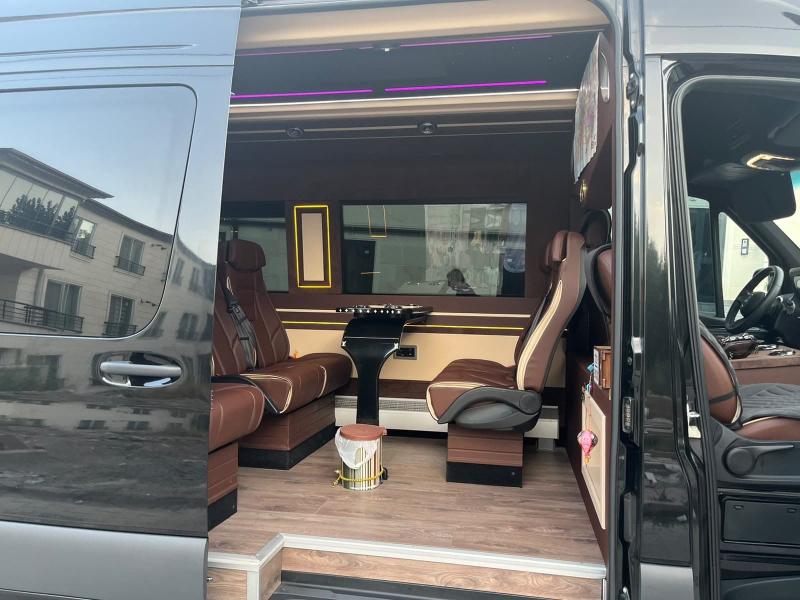Wide door entrance and interior of our VIP minibus