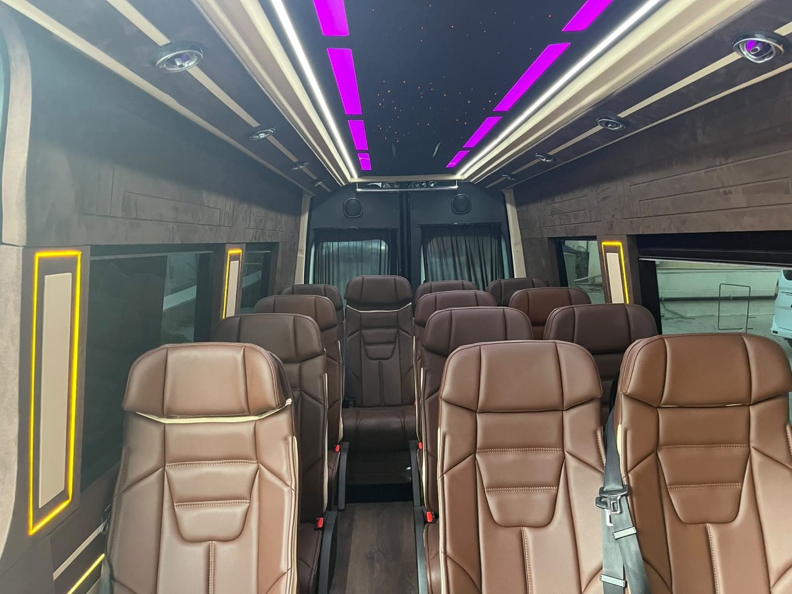 Rows of seats in our spacious VIP minibus